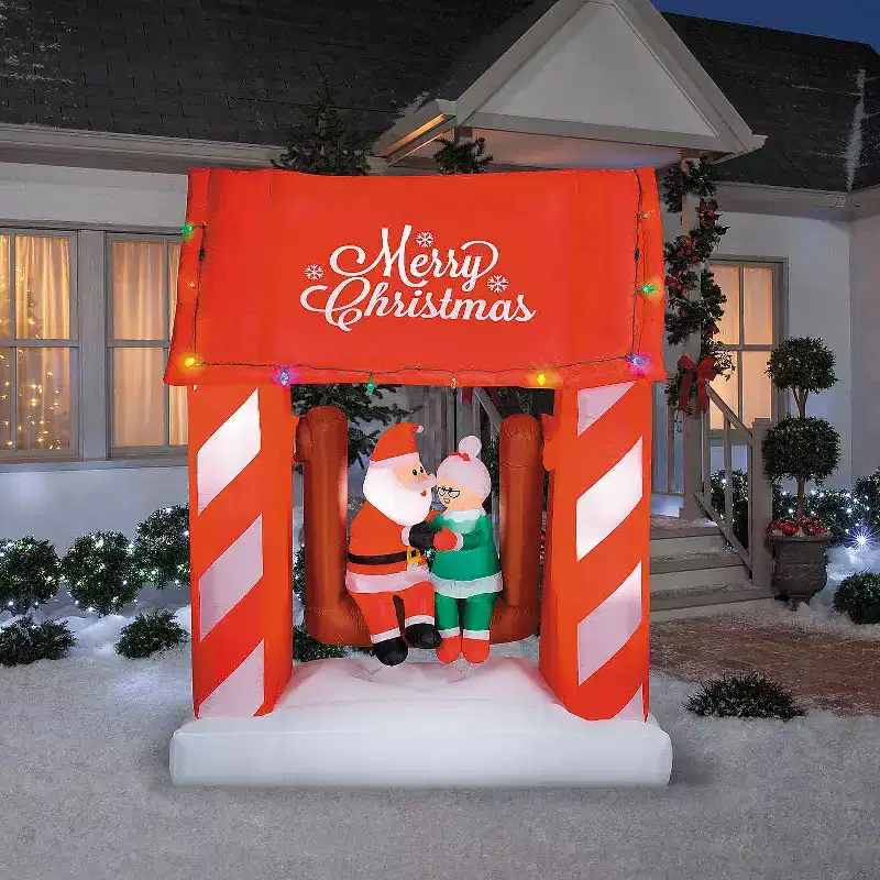 Gemmy 7 Ft. Airblown Inflatable Animated Mr. & Mrs. Santa Claus Porch Swing Scene - Red