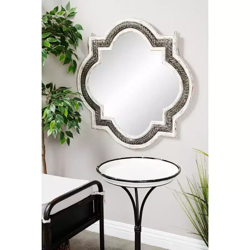 White wooden four-leaf clover wall mirror with Baroque wrought iron inlay; no assembly required.