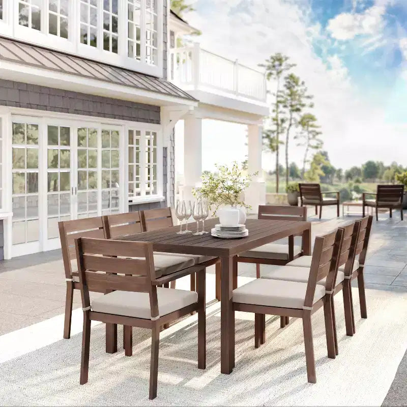 Martha Stewart Bedford Indoor-Outdoor Patio Set with 71 Table and 8 Dining Chairs with Brushed Woodgrain Aluminum Finish and All-Weather Seat Cushion