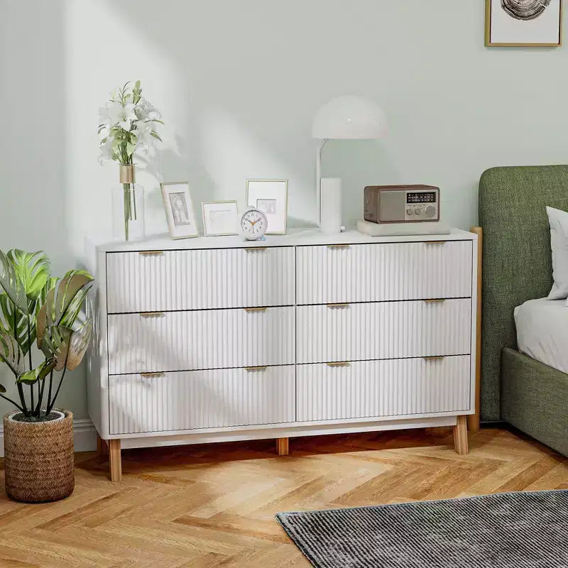 6-Drawer Double Dresser with Fluted Fronts Gold Finger Pulls Five Wooden Legs White