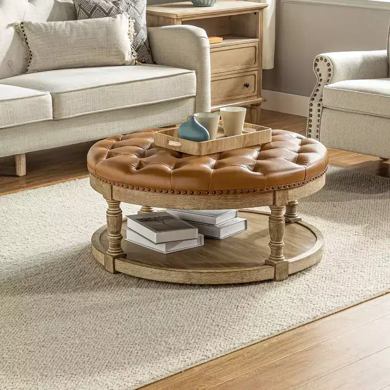 Chloe Vegan Leather Round Cocktail Ottoman with Storage and Nailhead| ART OF LIVING DESIGNS
